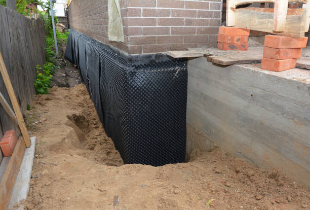 Happy homeowners after waterproofing job in Jonesville